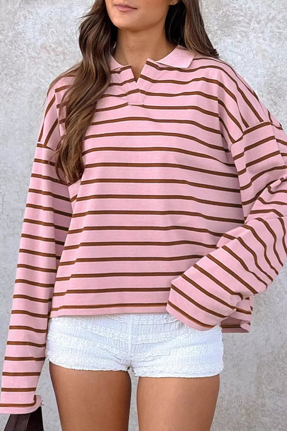 light pink polo shirt with striped and collared