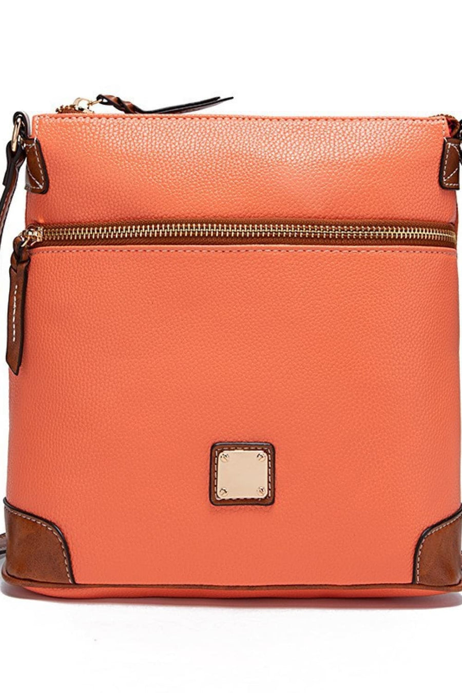 Tangerine leather crossbody bag with brown trim and gold hardware.