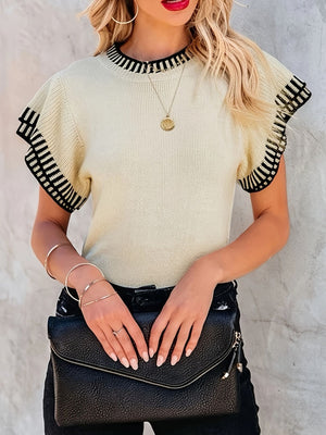 Cream knit sweater with ruffled sleeves and black striped trim, crew neck