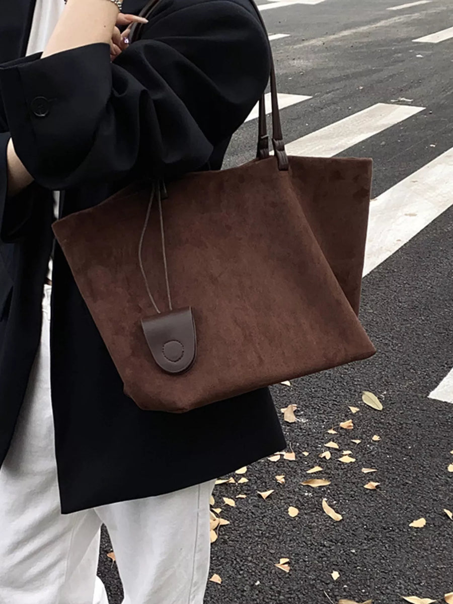 Large caramel brown suede tote bag shopper with leather detail and strap.