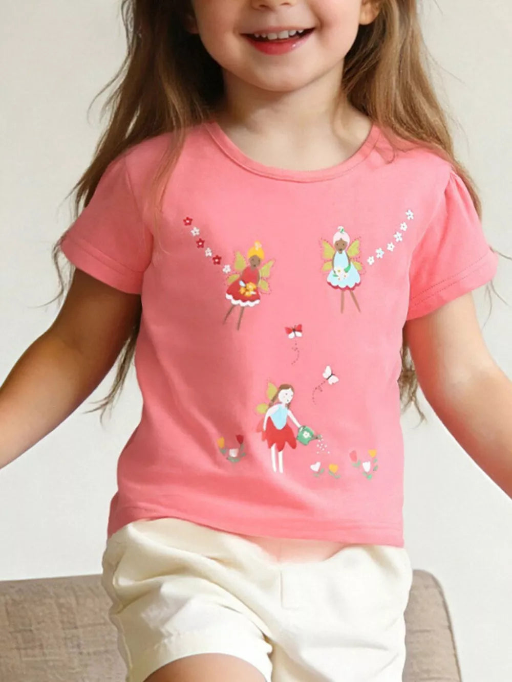 Coral t-shirt with fairy and butterfly print, short sleeves, round neck