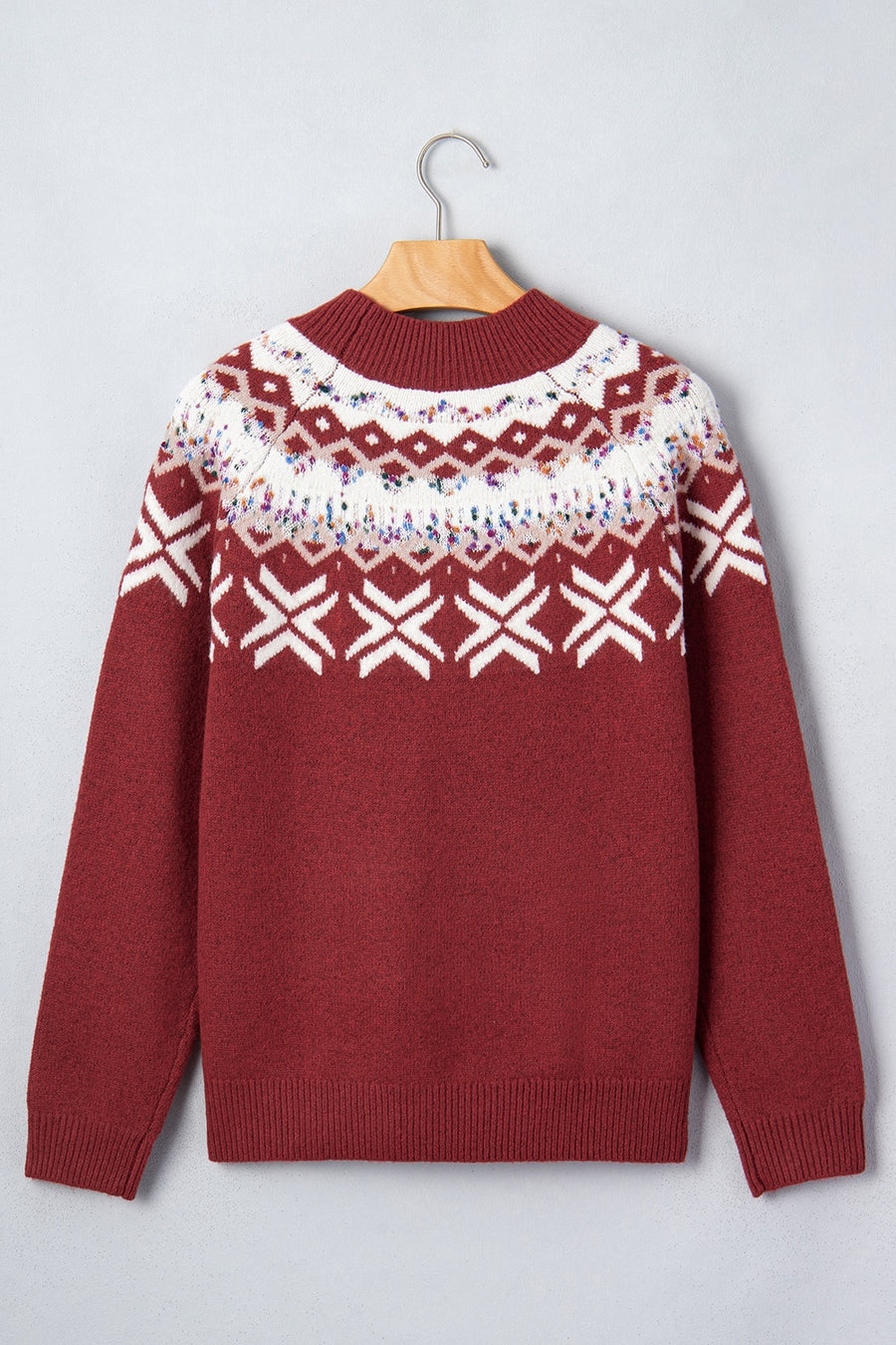 burgundy pullover sweater with ribbed cuffs and long sleeve
