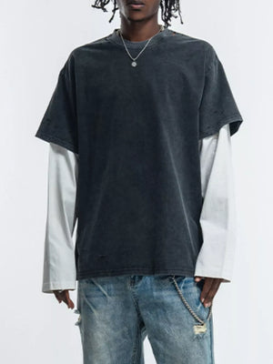 Men's black distressed fake two-piece long sleeve t-shirt with white undersleeve.