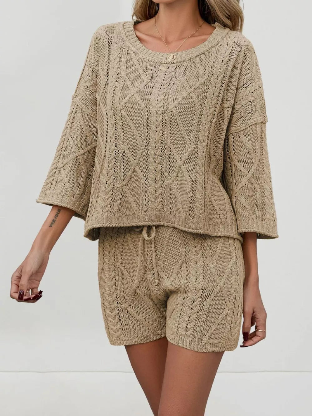 Cozy cable-knit two-piece sweater set in khaki with drawstring shorts and a relaxed fit sweater.