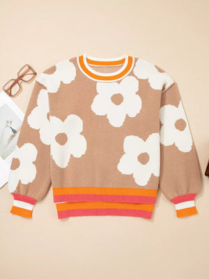 Tan floral pattern baggy sweater with orange and pink striped trim.