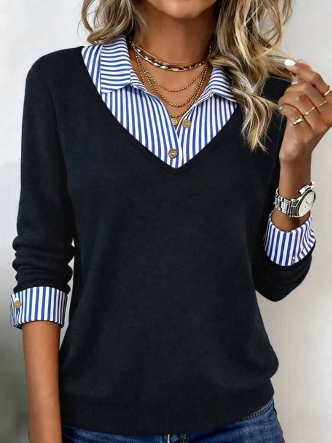 100% polyester Care instructions: Machine wash cold pullover sweater in Black with regular silhouette