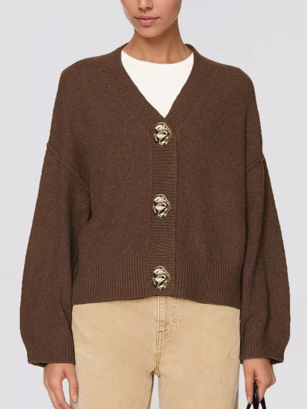 cardigan in chocolate brown featuring buttoned and relaxed fit
