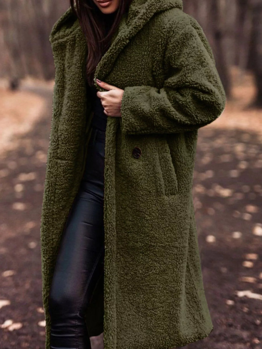 Army green teddy bear longline coat with hood, button closure, and pockets.