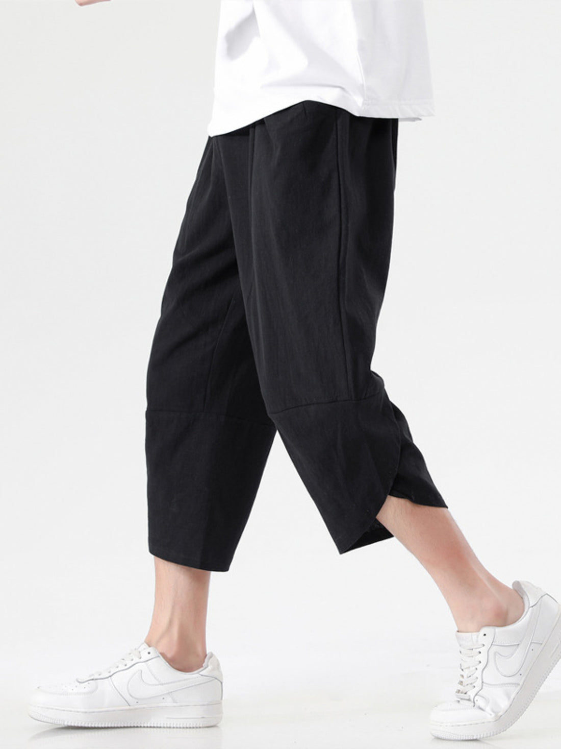harem pants in black featuring pocketed and loose fit