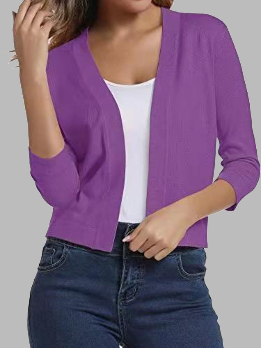 Cropped elbow-sleeve open-front knit cardigan in Dusty Purple, styled with a white tank top and jeans.