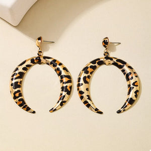 Crescent dangle earrings in gold with leopard print pattern