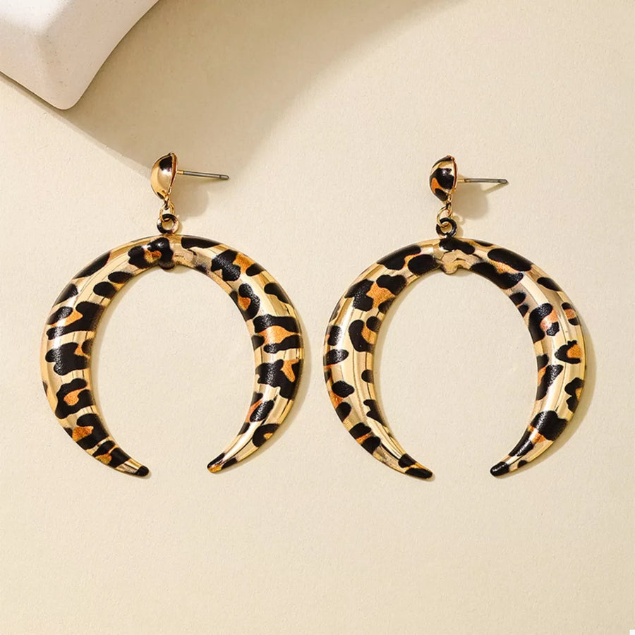 Crescent dangle earrings in gold with leopard print pattern