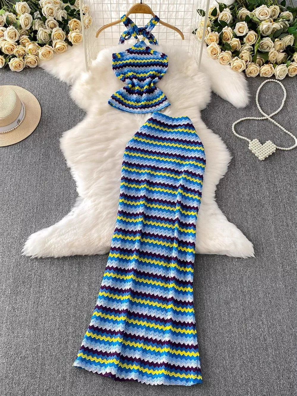 Chevron knit halter crop top and maxi skirt set in blue, yellow, and purple stripes.