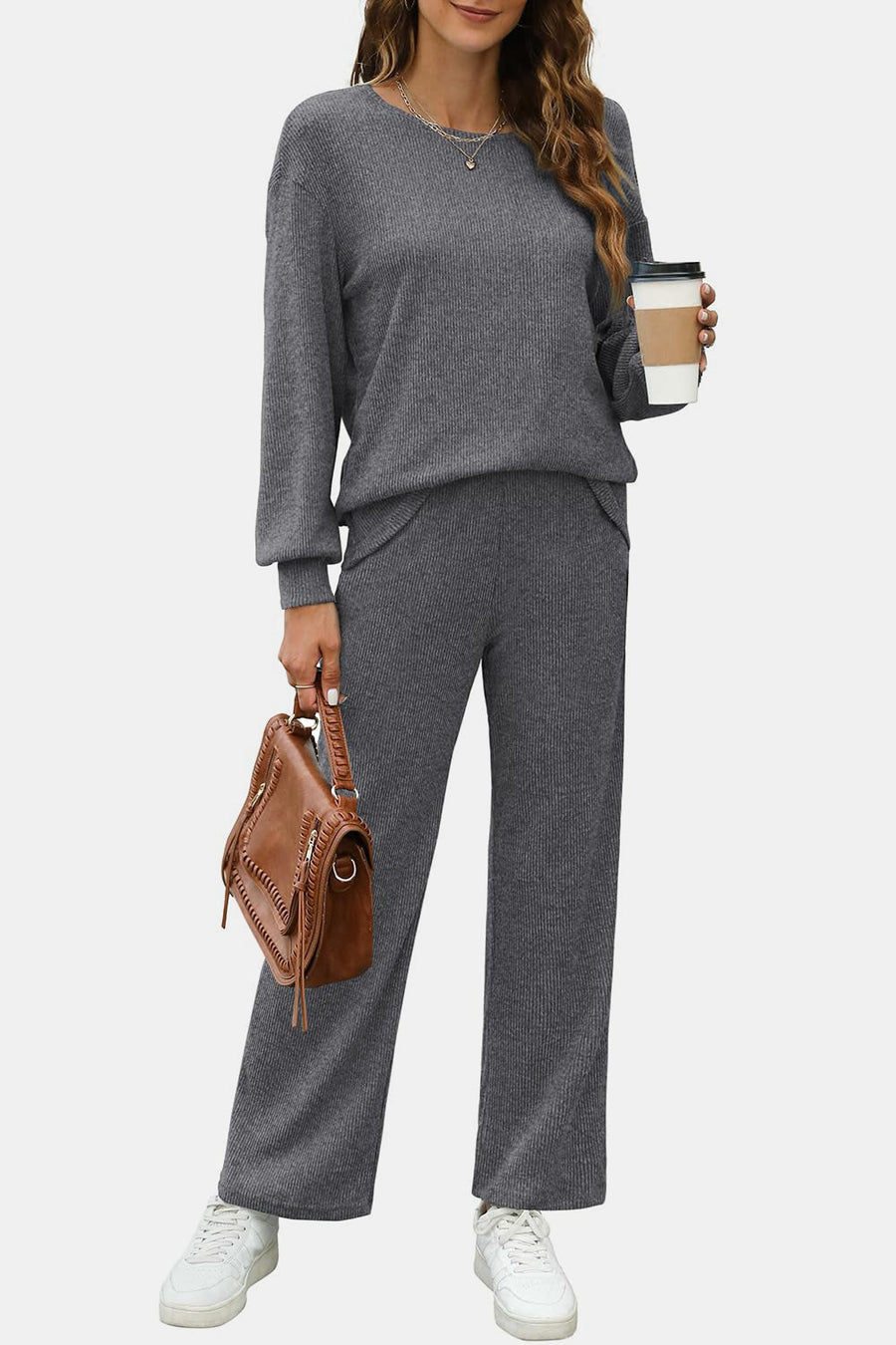 Dark gray ribbed knit lounge set with crew neck sweater and wide leg pants.