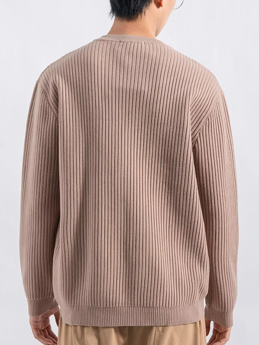 Men's apricot ribbed knit sweatshirt with crew neck and long sleeves.