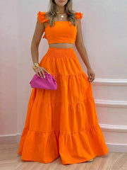 Orange ruffled crop top and tiered maxi skirt set with smocked waist