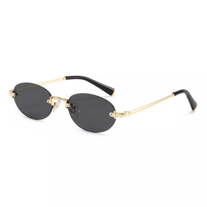 metal Frame material: Metal Lens material: Polycarbonate Temple material: Metal sunglasses in gold with oval silhouette