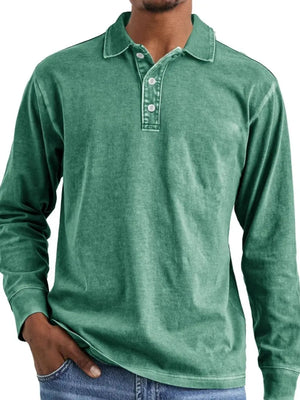 Green vintage wash long-sleeve polo shirt with button placket and spread collar.