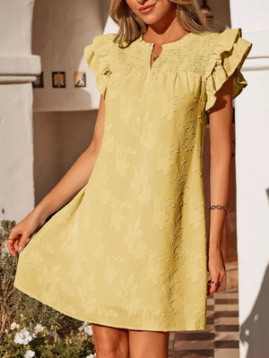Apricot floral embossed mini dress with smocked bodice and ruffled sleeves.