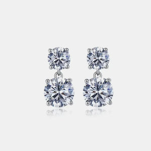 Silver double-drop cubic zirconia stud earrings with two round-cut stones.