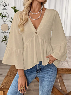 Apricot cotton V-neck bell sleeve blouse with tiered hem and button detail