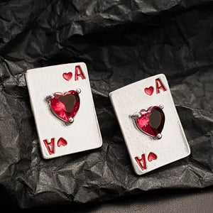 earrings in silver with playing card motif and rhinestone embellishment