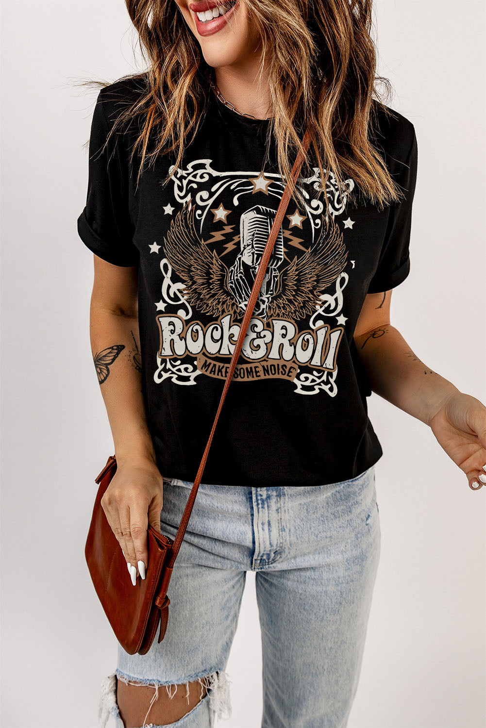 Black graphic t-shirt with Rock & Roll design and short sleeves.