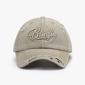 Khaki cotton baseball cap with distressed details and embroidered lettering