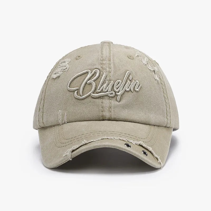 Khaki cotton baseball cap with distressed details and embroidered lettering