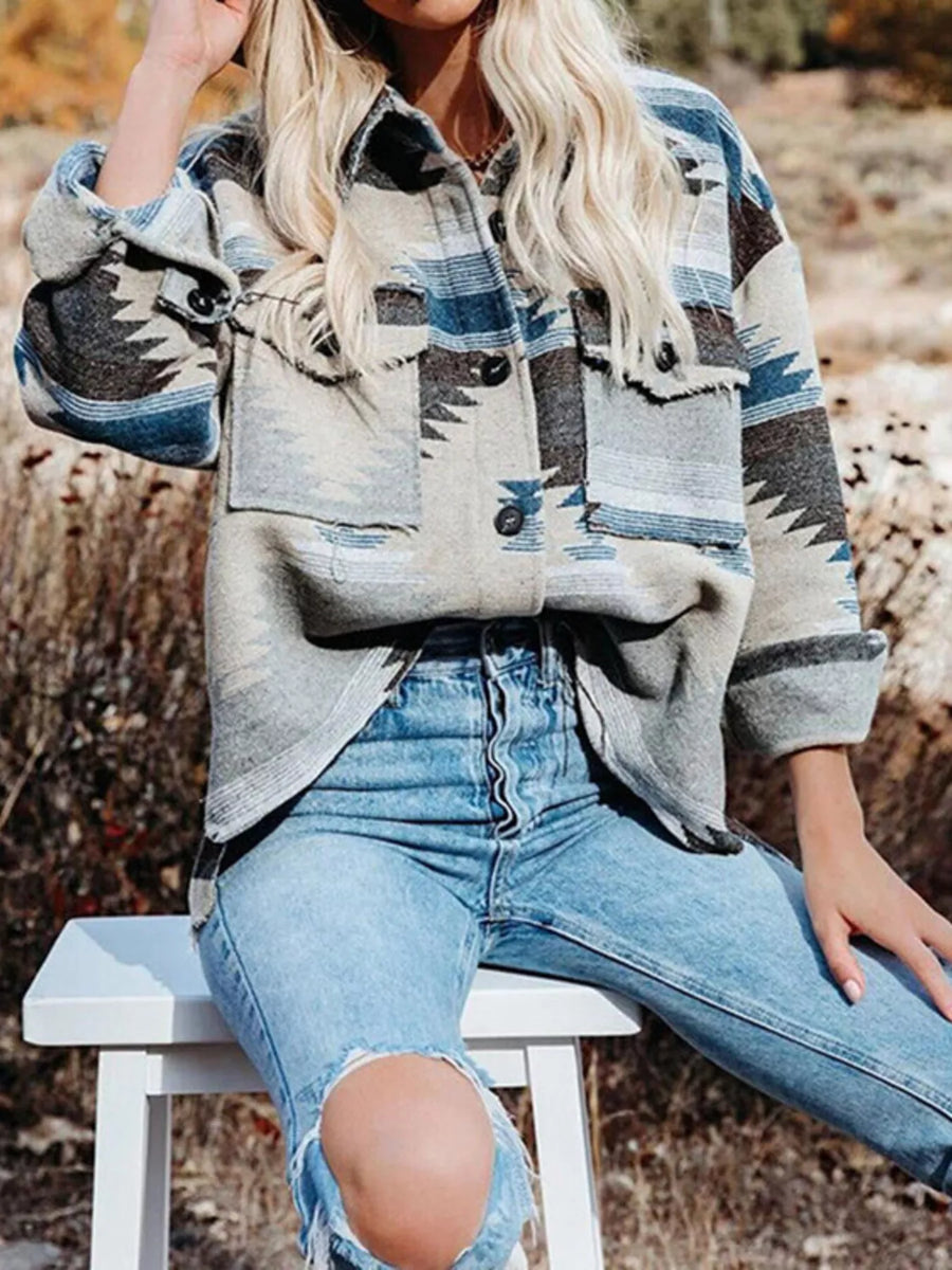 Geometric button-up jacket in peacock blue with a cotton blend, featuring a casual style and button pockets.