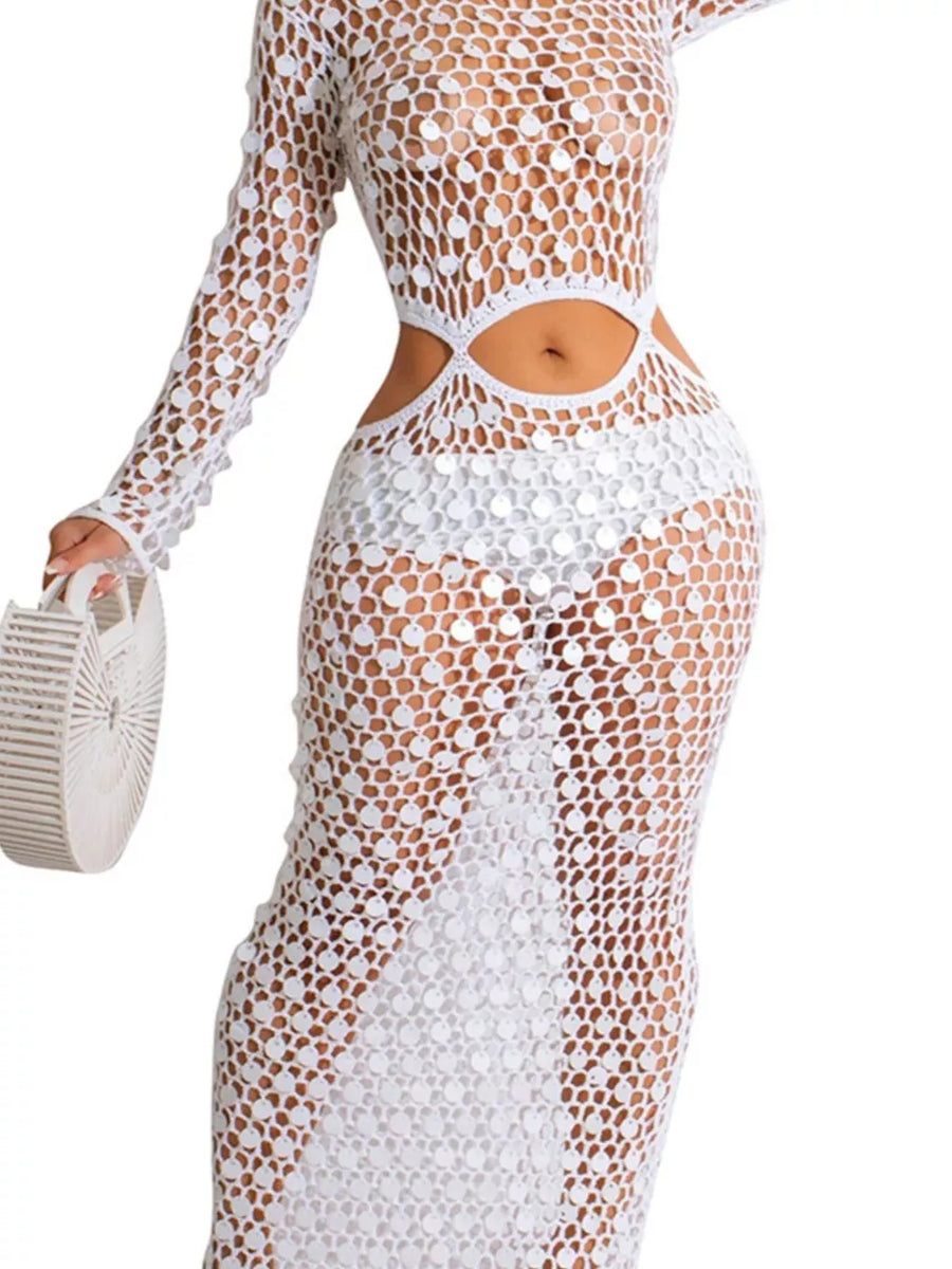 White mesh cutout maxi dress with sequin detail and long sleeves.