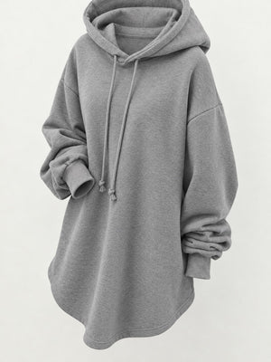 pullover hoodie in black with drawstring and tunic-length