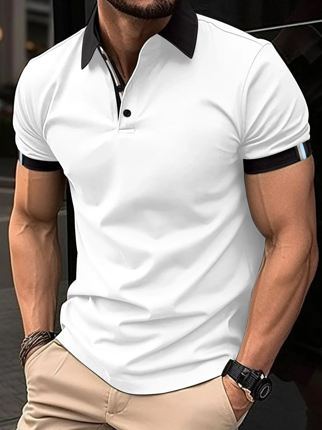 White polo shirt with black contrast collar and striped sleeve trim