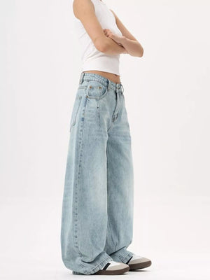 Men's light blue wide-leg stretch jeans with a relaxed fit and classic silhouette.