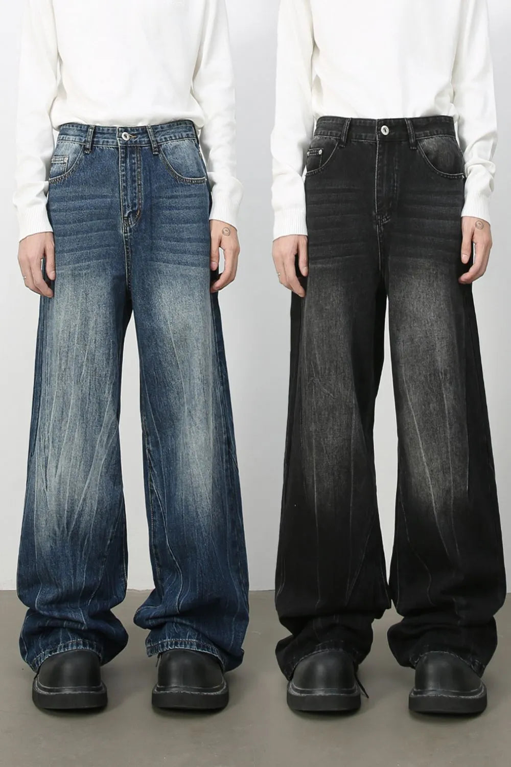 Oversized palazzo jeans in dark wash and medium wash denim with a distressed effect.