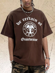 Brown oversized graphic t-shirt with white vintage-inspired print and crew neck.