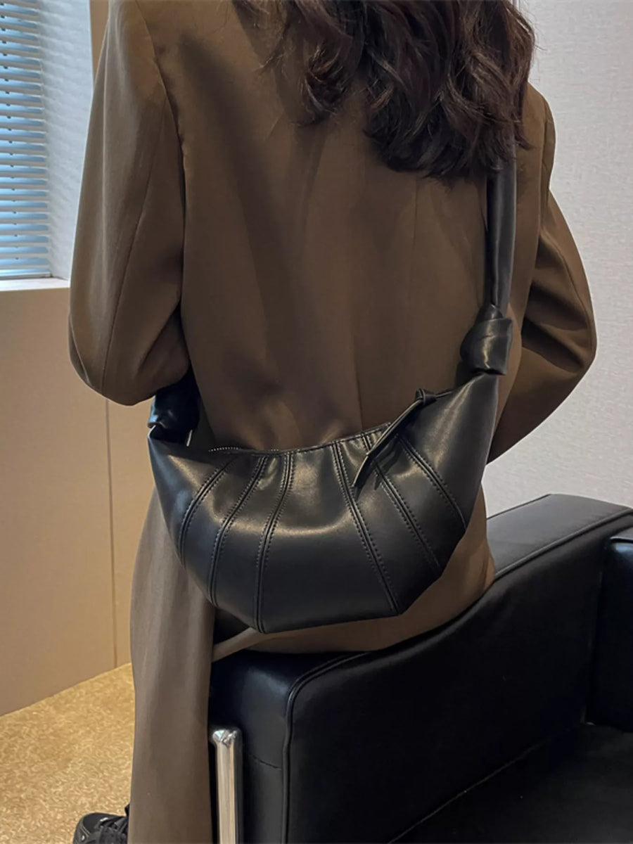 Chic Crescent Hobo Crossbody Bag in black with stitched detailing and knotted strap.