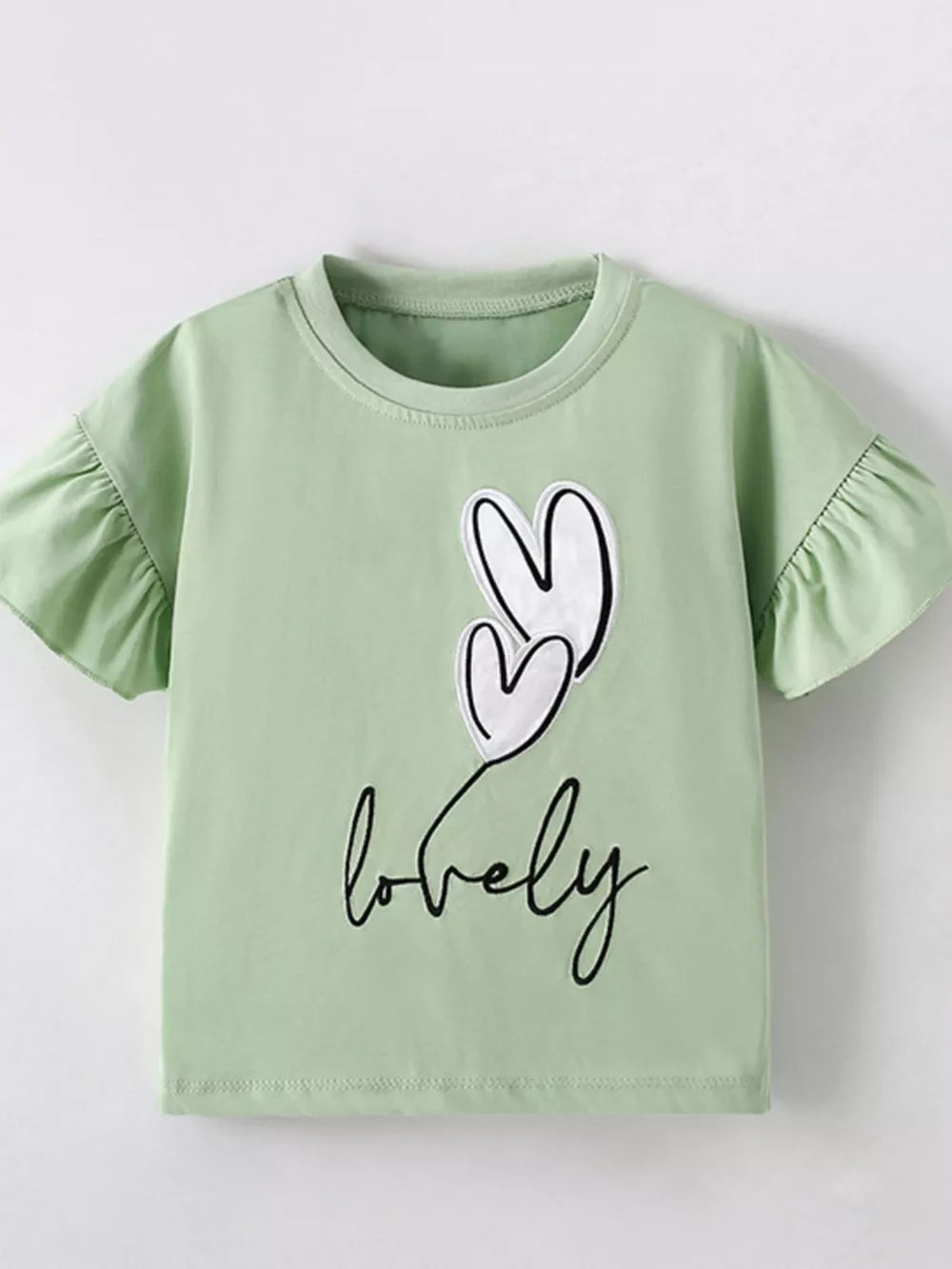 Light green cotton blend t-shirt with heart graphic and ruffle sleeves.