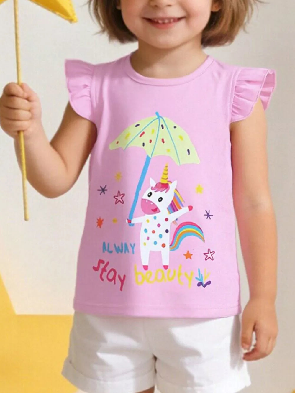 Pink cotton toddler tee with unicorn graphic, umbrella, and ruffle cap sleeves.