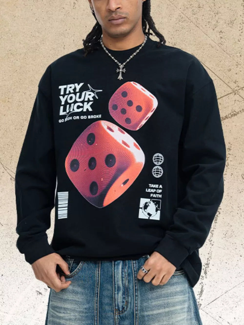 Black cotton long sleeve tee with bold dice graphic and text.