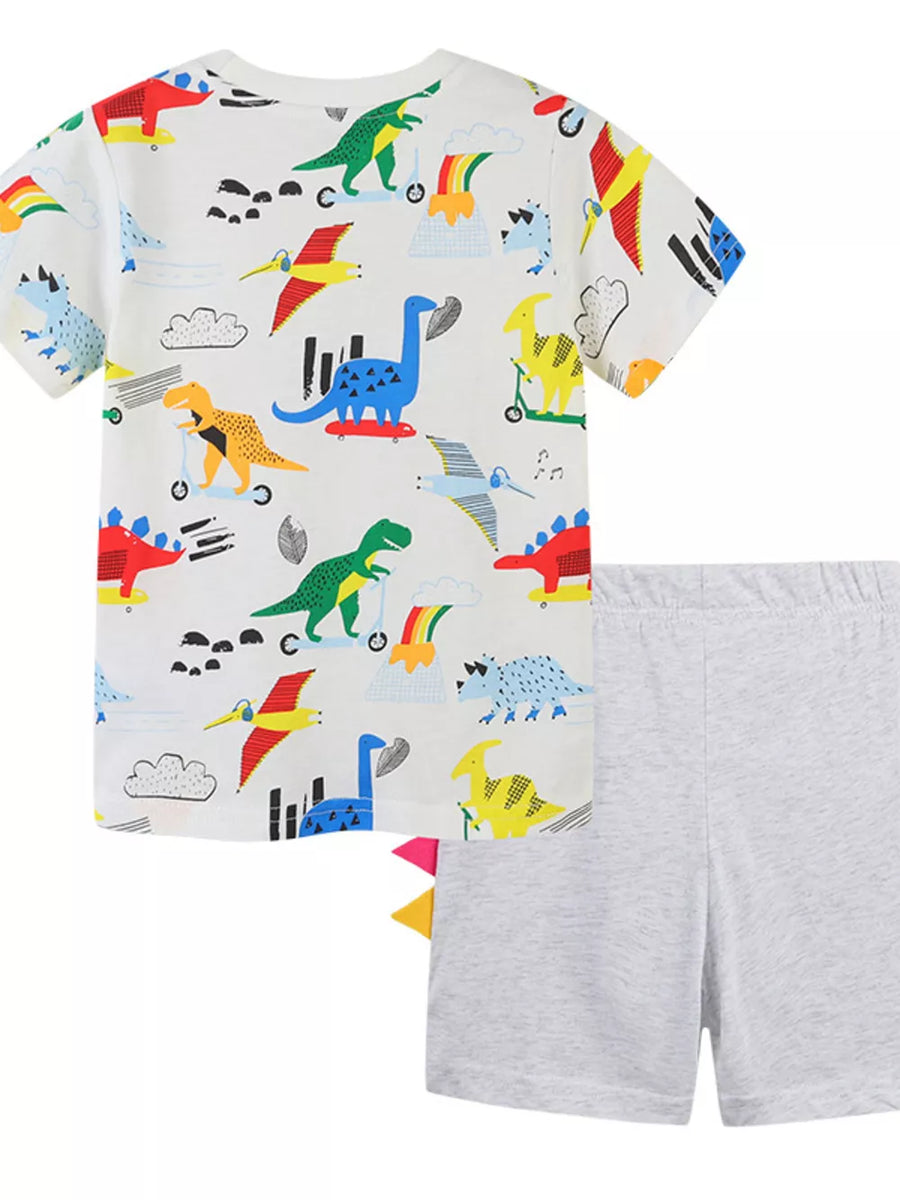 Toddler cotton tee with dinosaur print and grey shorts with dinosaur tail details.