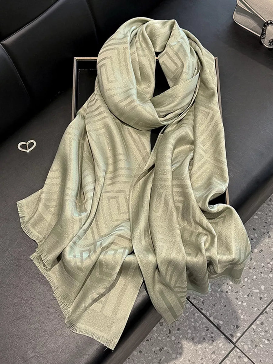Elegant Tencel cotton scarf in matcha green with geometric pattern and fringe detail