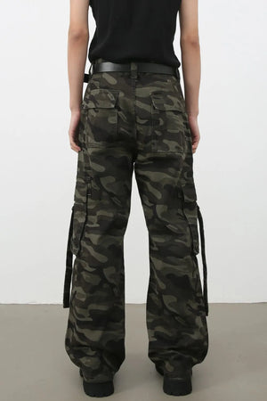 Wide-leg camo cargo pants with belt detail and multiple pockets.