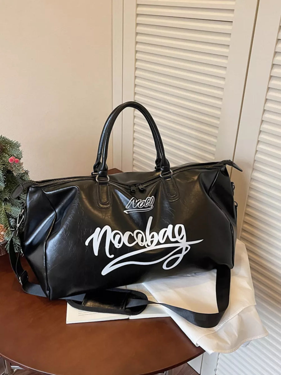 Black PU leather travel bag with white script logo and shoulder strap