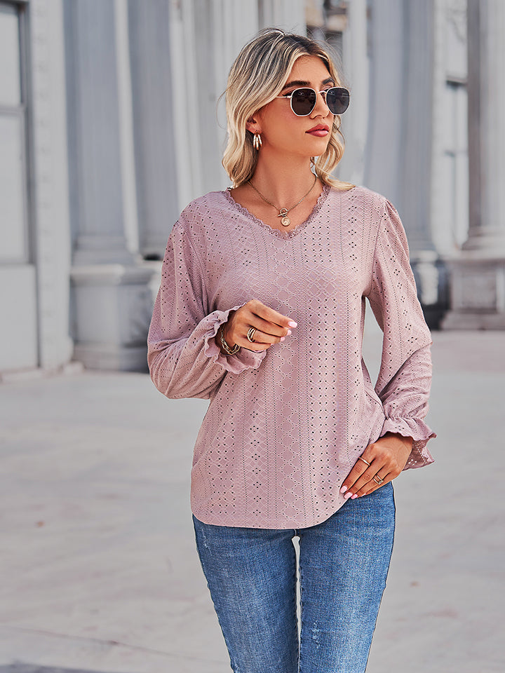 Blush pink lace-cut prairie blouse with v-neck and ruffled sleeves