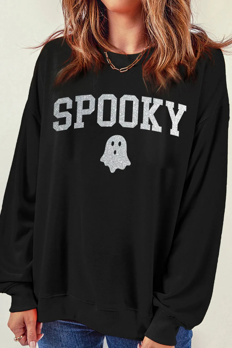 Black sweatshirt with glitter "Spooky" graphic and ghost detail