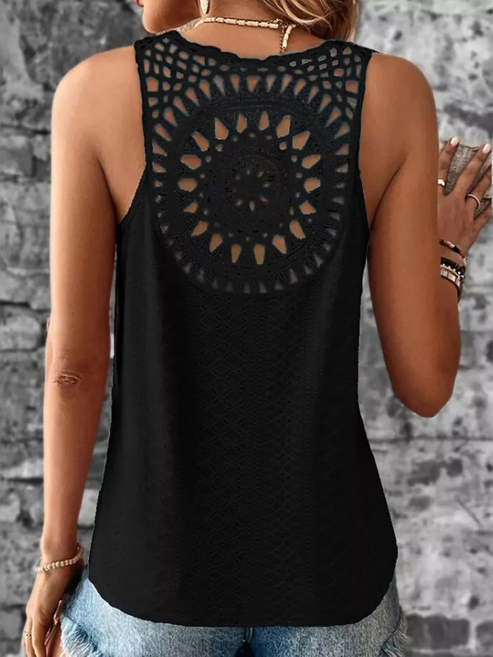 Black eyelet lace tank top with crochet back detail and V-neck.