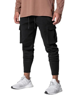 Black Tech-Knit Cargo Joggers with drawstring waist and zip pocket detail.