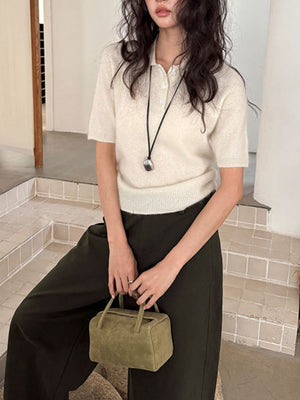 90% wool, 5% cashmere, 5% mulberry silk Care instructions: Hand wash cold polo shirt in Black with regular silhouette