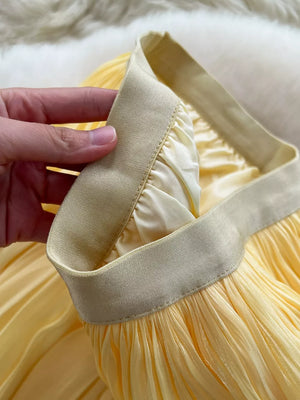 Yellow pleated maxi skirt with elastic waistband detail